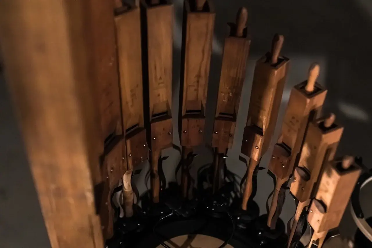 Organism: In Turbulence — close-up of the wooden organ pipes and robotic mechanisms